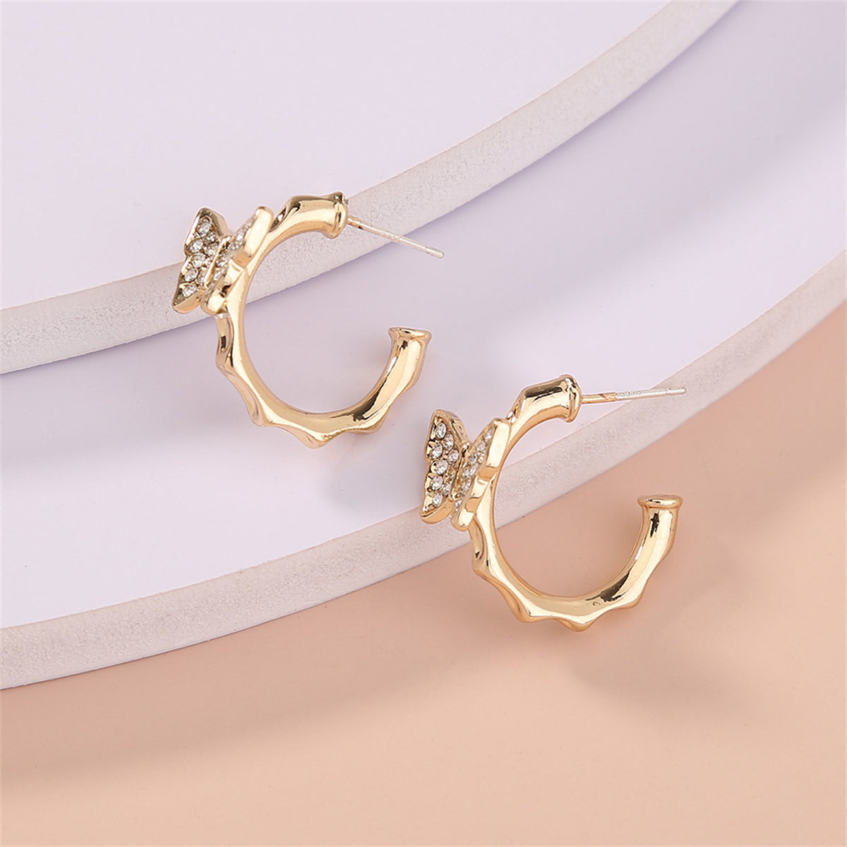 Cubic Zirconia and 18K Gold-Plated Butterfly Huggie Earrings, gold huggie earrings, everyday style, detail close-up