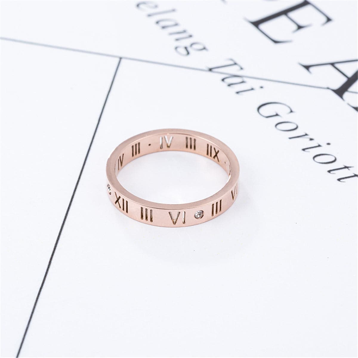 Cubic Zirconia and 18K Rose Gold-Plated Roman Numeral Band Ring, rose gold statement rings for women, detail close-up