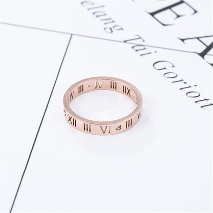 Cubic Zirconia and 18K Rose Gold-Plated Roman Numeral Band Ring, rose gold statement rings for women, detail close-up