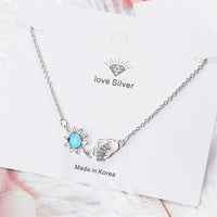 Blue Crystal & Cubic Zirconia Sun & Cloud Pendant Necklace