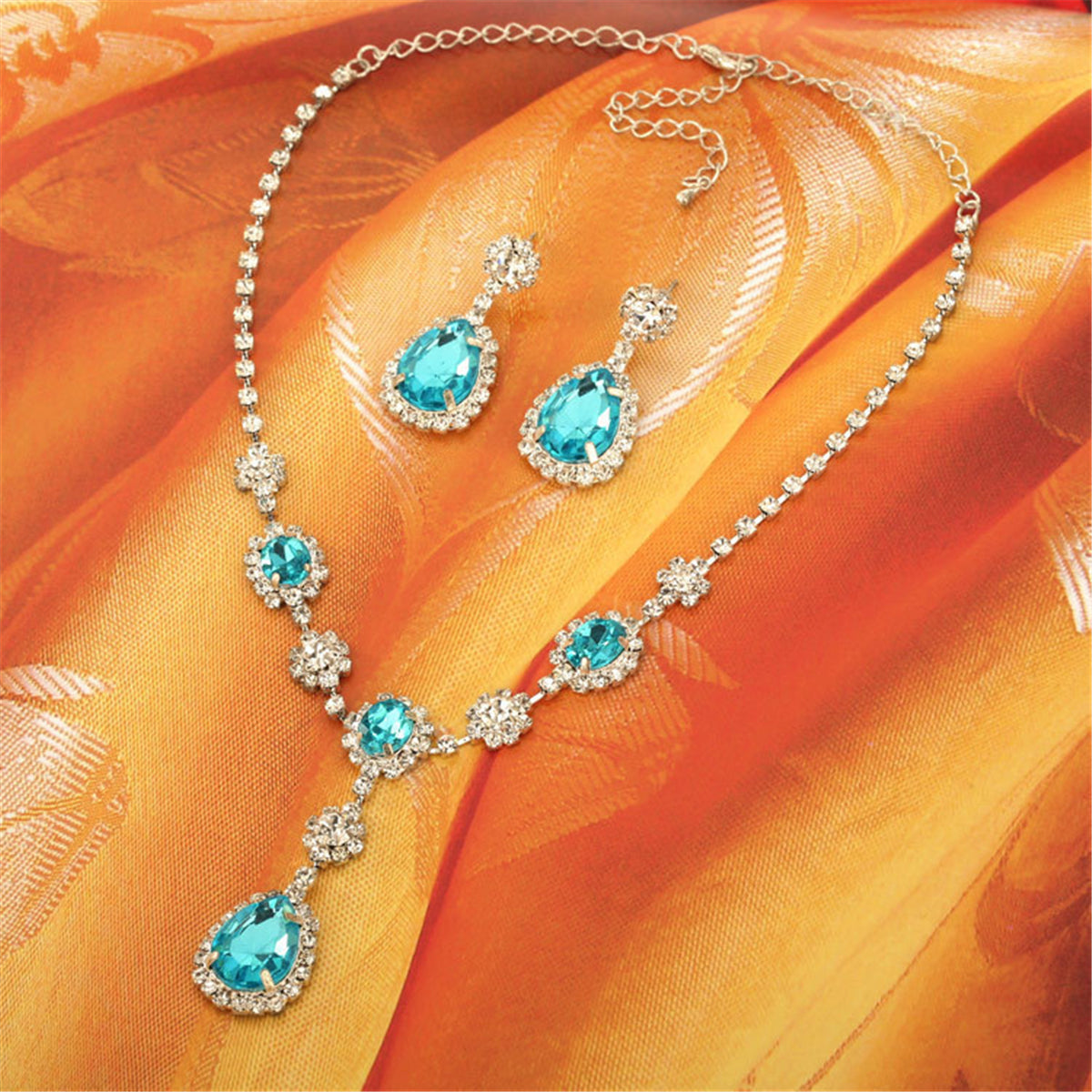 Blue Crystal and Cubic Zirconia Drop Earrings and Statement Necklace, drop earrings for women, botanical inspired, front view