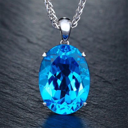 Blue Crystal and Silver-Plated Oval-Cut Pendant Necklace, silver pendant necklace for women, everyday style, detail close-up