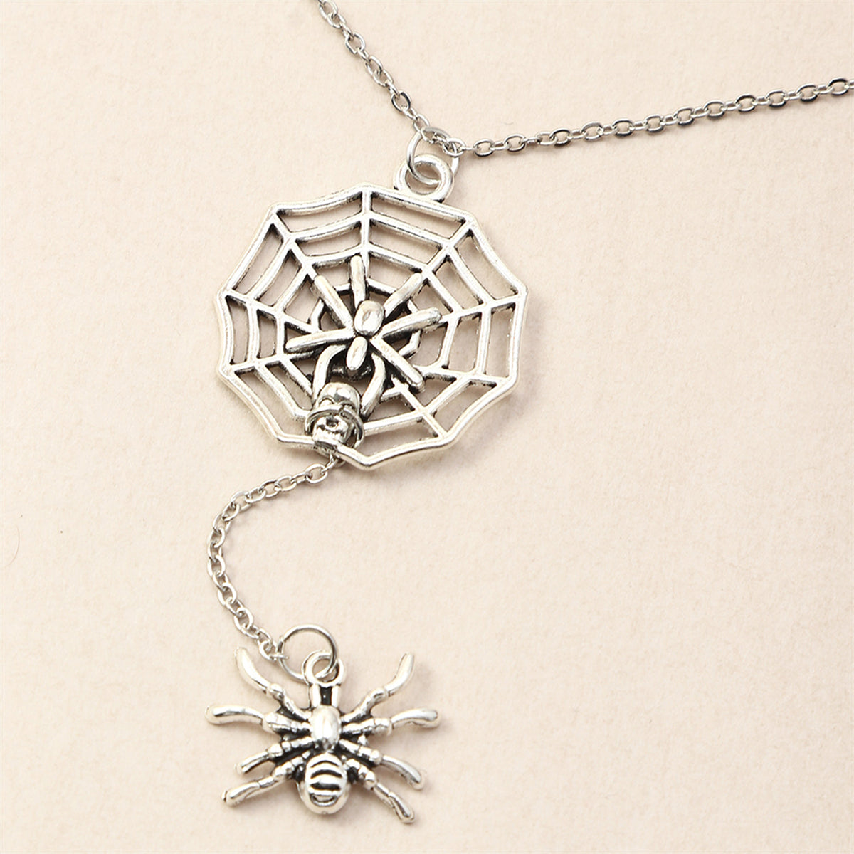 Silver-Plated Spider and Web Drop Necklace, silver pendant necklace for women, botanical inspired, lifestyle look