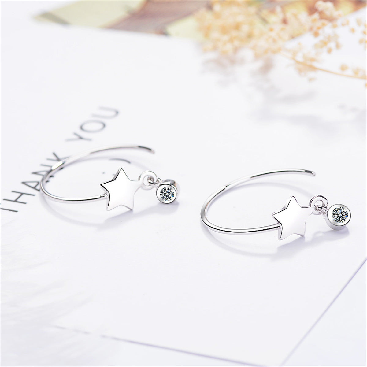 Cubic Zirconia and Silver-Plated Star Hoop Earrings, silver drop earrings for women, dainty minimalist design, side view