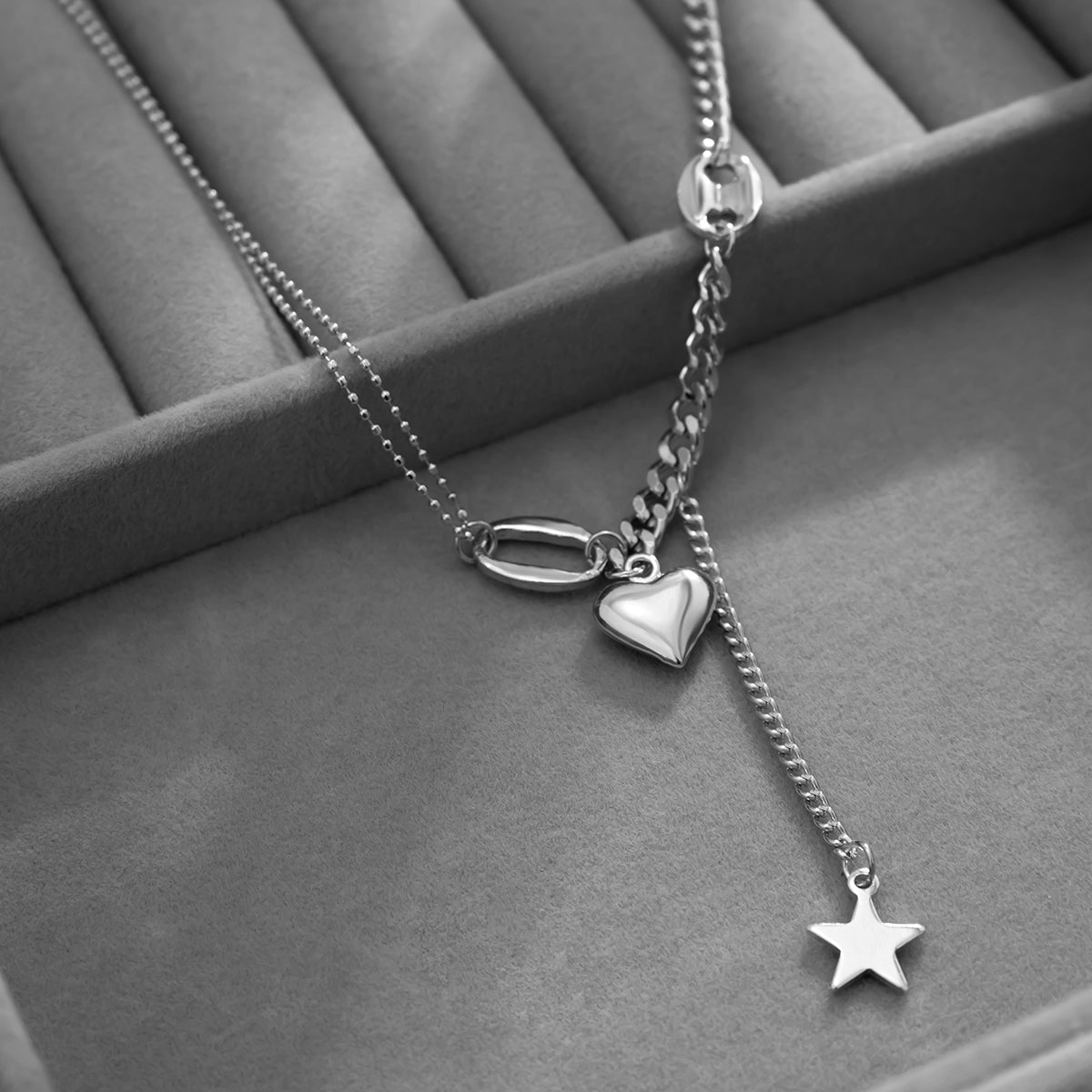 Silver-Plated Heart and Star Pendant Necklace, silver pendant necklace for women, everyday style, detail close-up