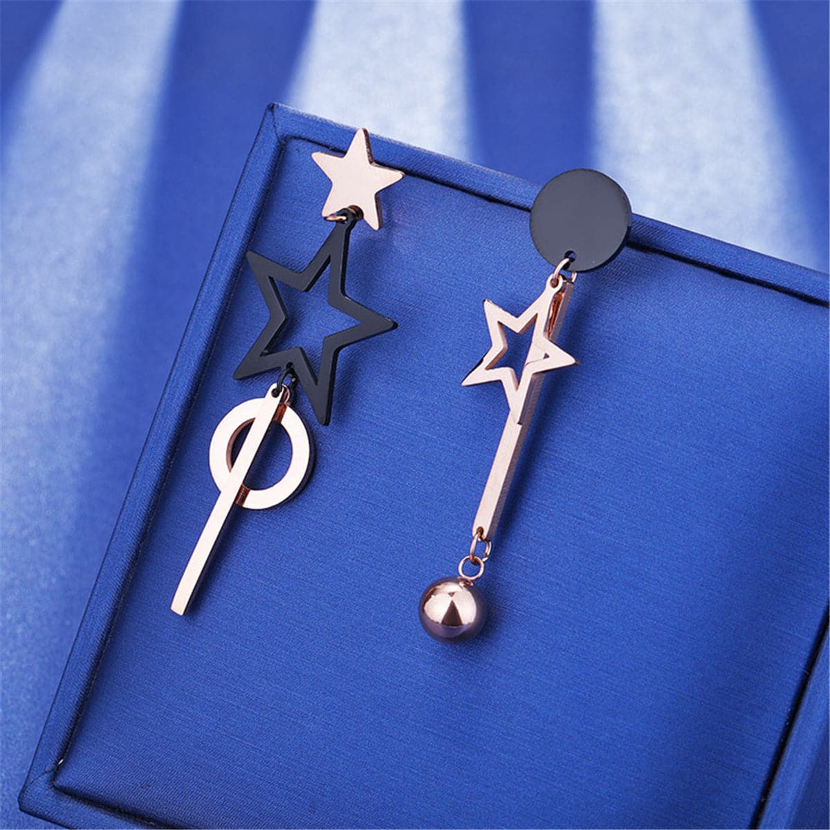 Black and 18K Rose Gold-Plated Star Asymmetric Drop Earrings, rose gold drop earrings for women, detail close-up