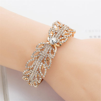 Cubic Zirconia and 18K Gold-Plated Open Butterfly Bangle, gold bangle bracelet, vintage-inspired design, front view