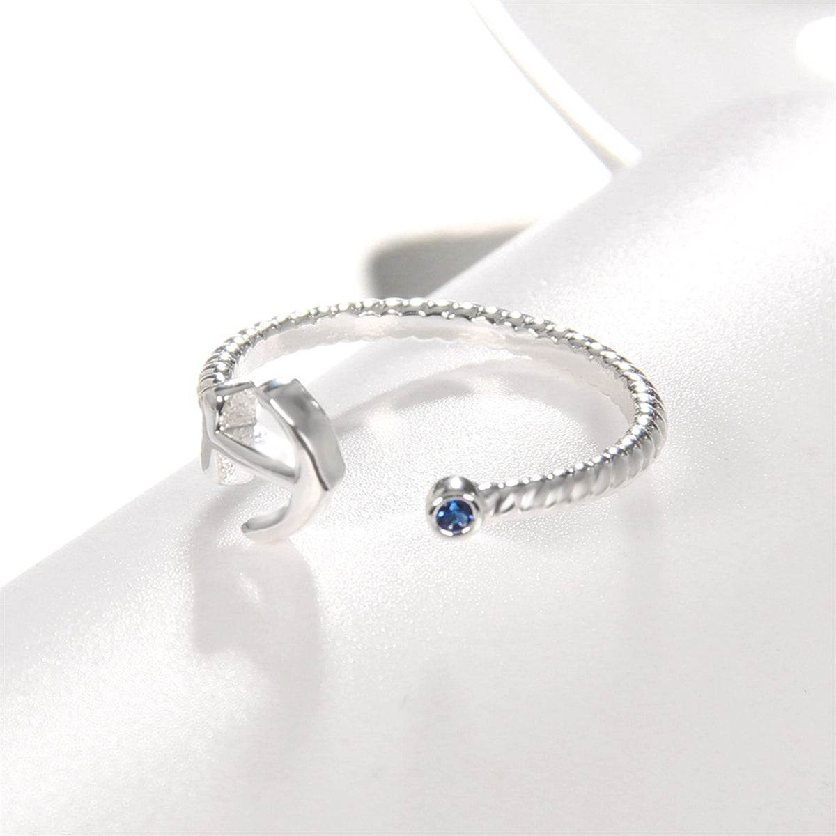 Blue Cubic Zirconia and Silver-Plated Anchor Open Ring, silver statement rings for women, detail close-up