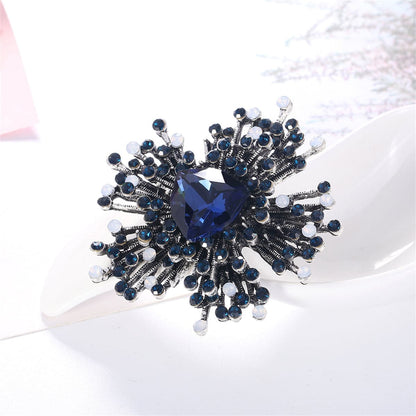 Blue Cubic Zirconia and Silver-Plated Flower Brooch, silver brooch pin, vintage-inspired design, lifestyle look