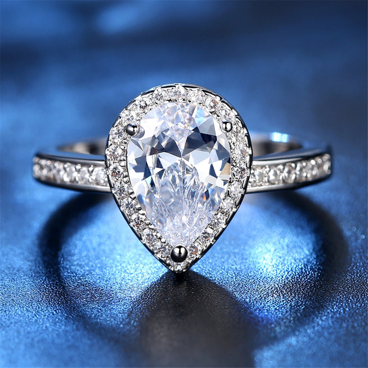 Blue Crystal and Cubic Zirconia Teardrop Halo Ring, statement rings for women, botanical inspired, front view