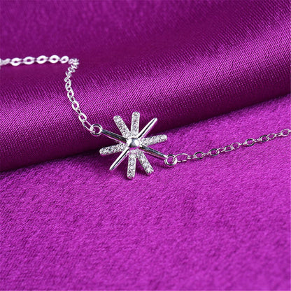 Cubic Zirconia and Silver-Plated Snowflake Charm Anklet, silver anklet bracelet, everyday style, detail close-up