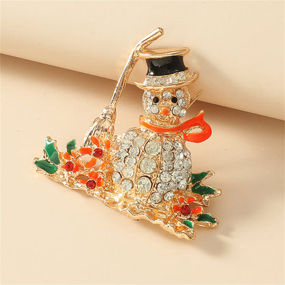 Orange Enamel and Cubic Zirconia Broom Snowman Brooch, brooch pin, vintage-inspired design, styled look