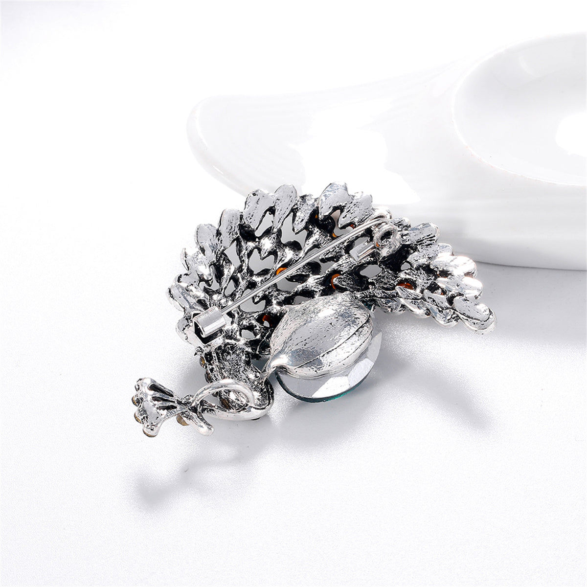 Clear Cubic Zirconia and Silver-Plated Peacock Brooch, silver brooch pin, dainty minimalist design, lifestyle look