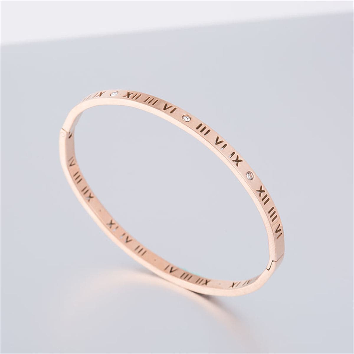 Cubic Zirconia and 18K Rose Gold-Plated Roman Numeral Bangle, rose gold bangle bracelet, everyday style, side view