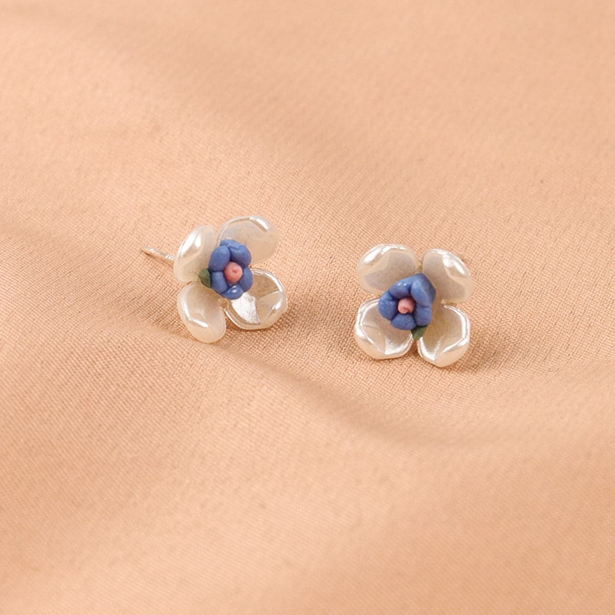 Blue Acrylic and 18K Gold-Plated Floral Stud Earrings, gold stud earrings for women, botanical inspired, detail close-up