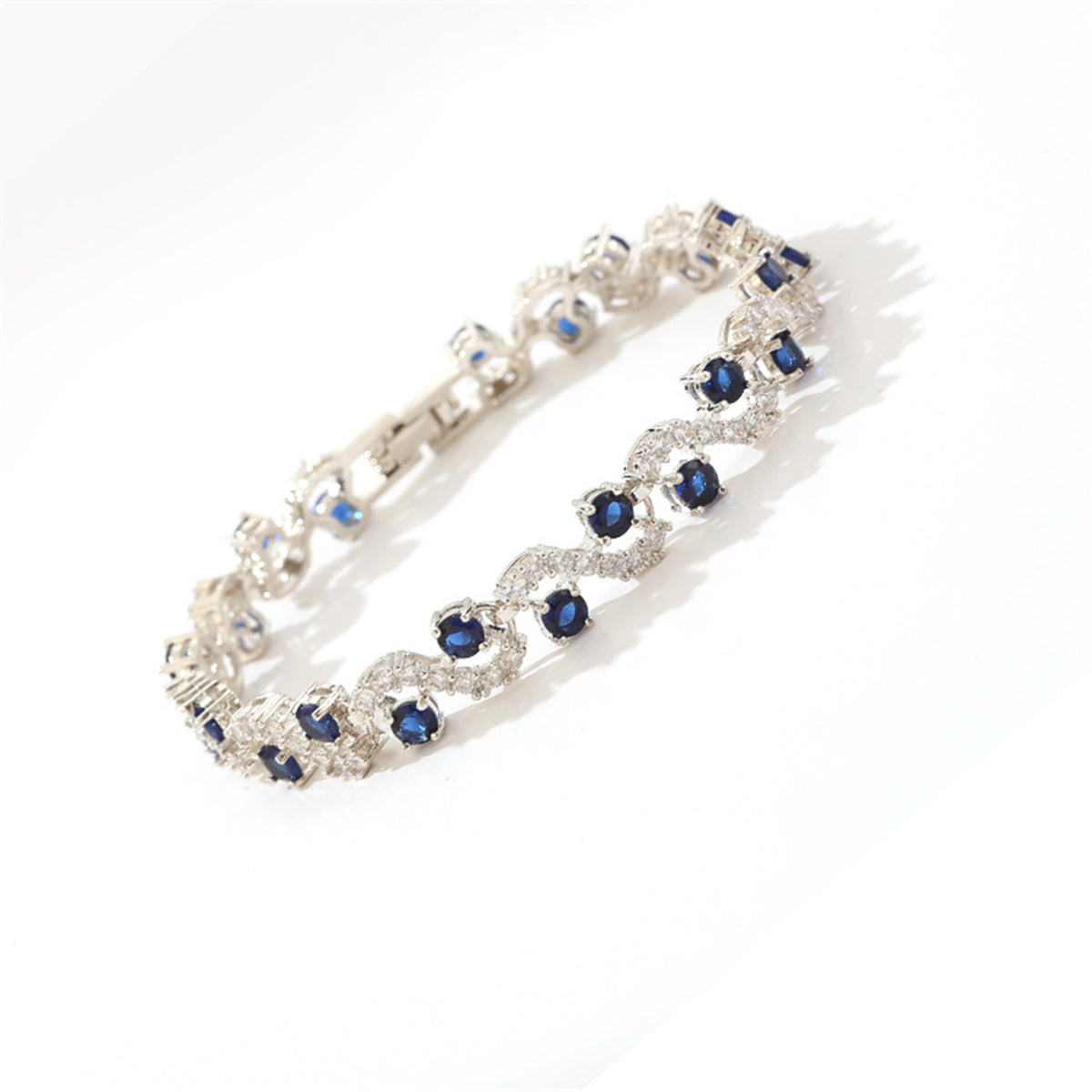 Cubic Zirconia & Blue Crystal Prong Crossing Line Tennis Bracelet