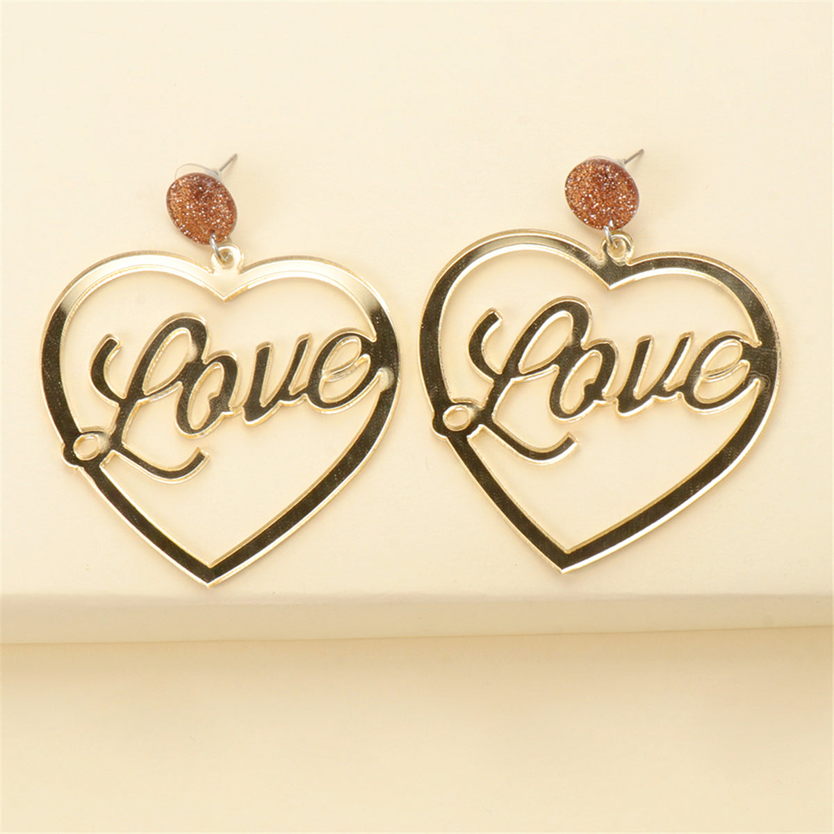 Silver-Plated 'Love' Drop Earrings, silver drop earrings for women, dainty minimalist design, lifestyle look