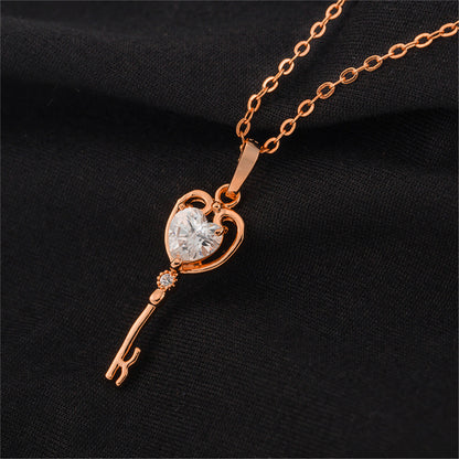 White Crystal and 18K Rose Gold-Plated Key Pendant Necklace, rose gold pendant necklace for women, detail close-up