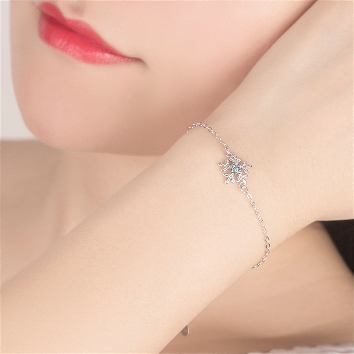 Cubic Zirconia and Silver-Plated Snowflake Charm Bracelet, silver bracelet for women, dainty minimalist design, side view