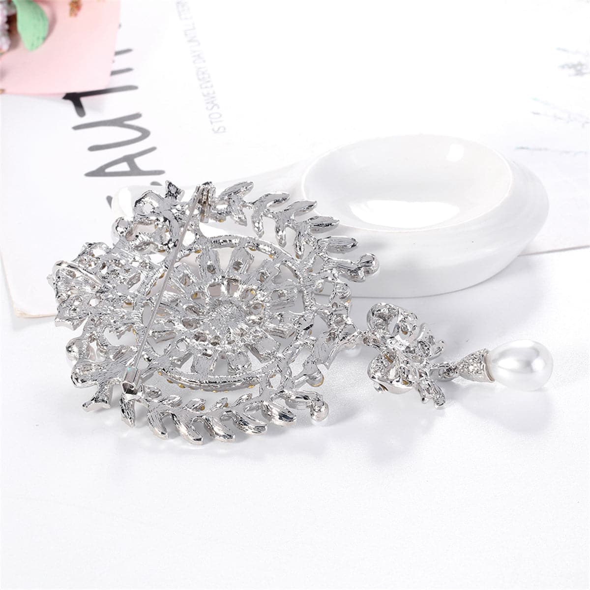 Clear Cubic Zirconia and Silver-Plated Botany Bow Brooch, silver brooch pin, vintage-inspired design, side view