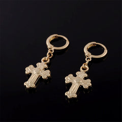 Stunning 18K gold-plated cross huggie drop earrings, a chic accessory that beautifully blends elegance and spirituality.
