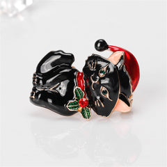 A luxurious black cat brooch showcasing a Santa hat, beautifully crafted in 18K gold-plated with shimmering cubic zirconia.