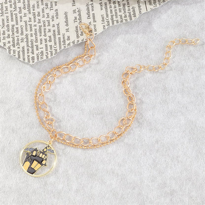 Black Enamel and 18K Gold-Plated Castle Layered Charm Bracelet, gold bracelet for women, everyday style, detail close-up