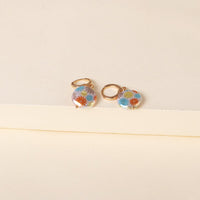 White Floral Imitation Pearl & Goldtone Drop Earrings