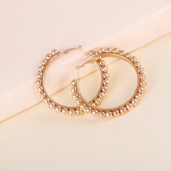 Chic 18K gold-plated bead hoop earrings made from metal, a must-have accessory to enhance your everyday style.
