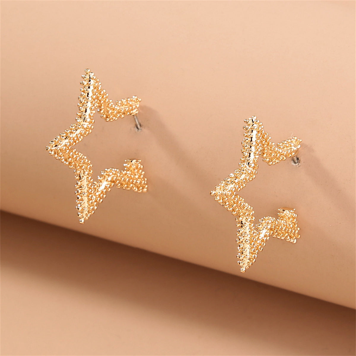 18K Gold-Plated Open Star Huggie Earrings, gold huggie earrings, vintage-inspired design, lifestyle look