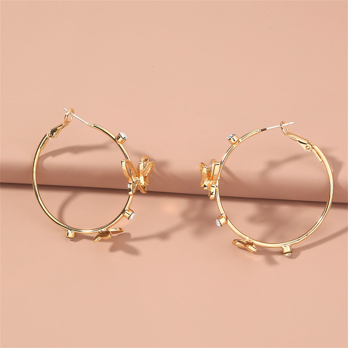 Cubic Zirconia and 18K Gold-Plated Butterfly Hoop Earrings, vintage-inspired design, detail close-up