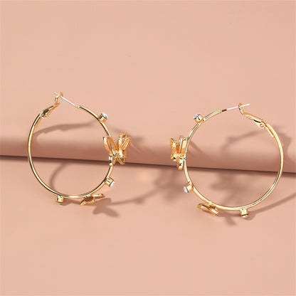 Cubic Zirconia and 18K Gold-Plated Butterfly Hoop Earrings, vintage-inspired design, detail close-up