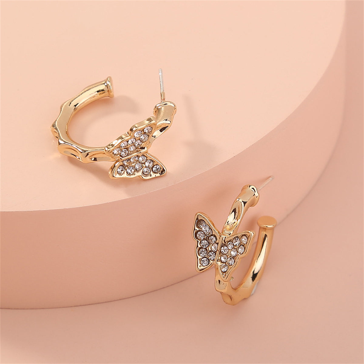 Cubic Zirconia and 18K Gold-Plated Butterfly Huggie Earrings, gold huggie earrings, everyday style, styled look