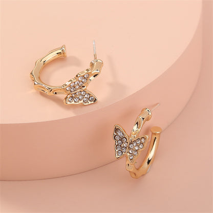 Cubic Zirconia and 18K Gold-Plated Butterfly Huggie Earrings, gold huggie earrings, everyday style, styled look