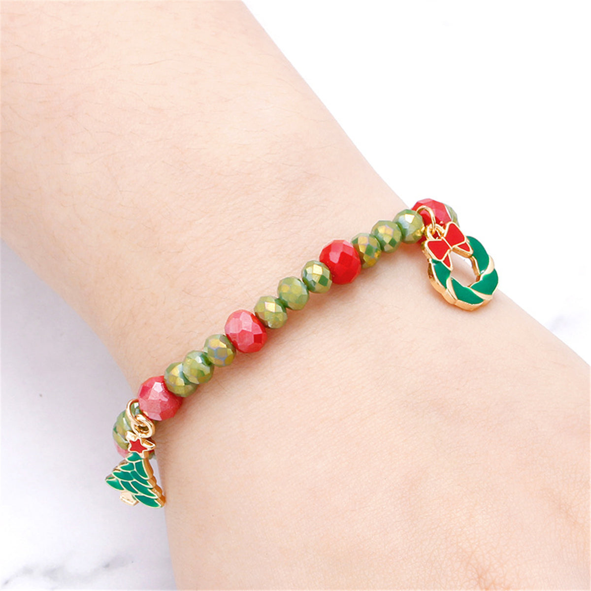 Green Enamel and Silver-Plated Beaded Christmas Tree and Bow Stretch Bracelet, silver bracelet for women, detail close-up
