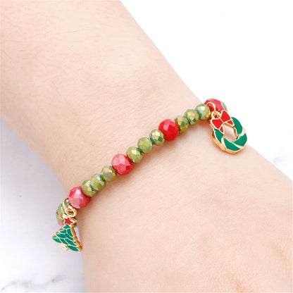 Green Enamel and Silver-Plated Beaded Christmas Tree and Bow Stretch Bracelet, silver bracelet for women, detail close-up