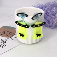 Green & Silvertone UFO Beam Drop Earrings