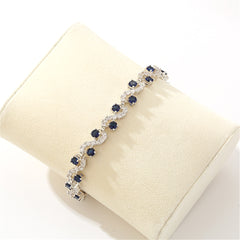 Cubic Zirconia & Blue Crystal Prong Crossing Line Tennis Bracelet