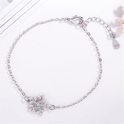 Cubic Zirconia and Silver-Plated Snowflake Charm Bracelet, silver bracelet for women, detail close-up