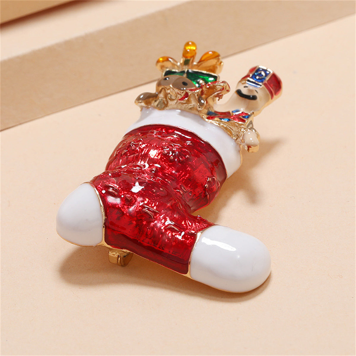 Red Enamel and 18K Gold-Plated Christmas Stocking Brooch, gold brooch pin, dainty minimalist design, detail close-up