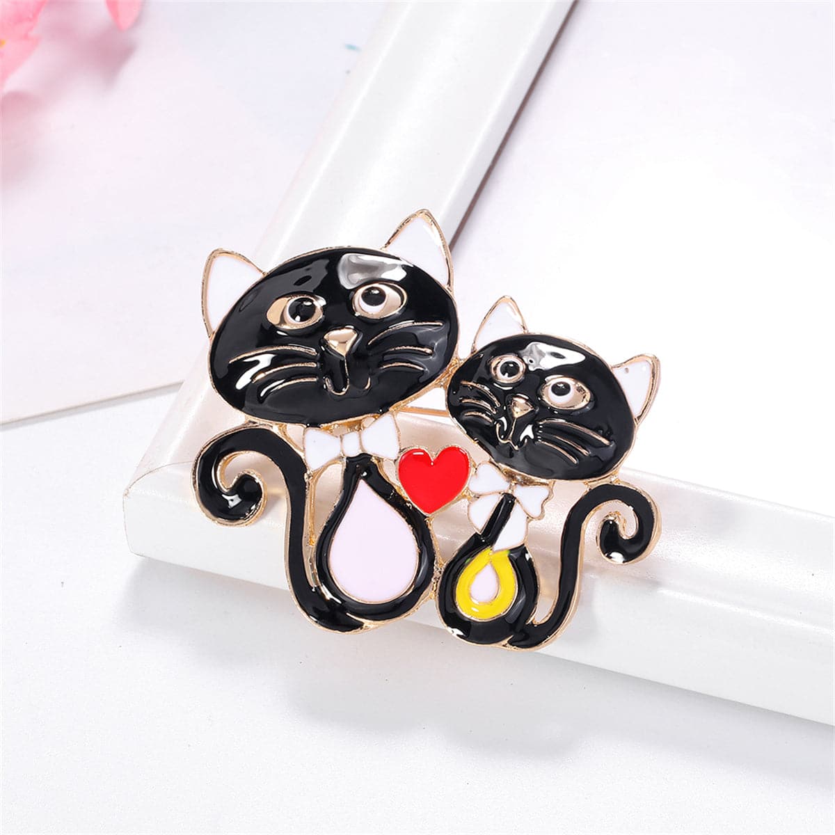 Black Enamel and 18K Gold-Plated Double-Cat Brooch, gold brooch pin, vintage-inspired design, lifestyle look