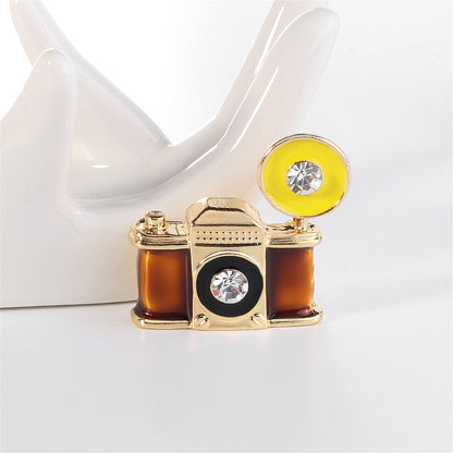 Cubic Zirconia and Gold-Plated Camera Brooch, gold brooch pin, dainty minimalist design, side view