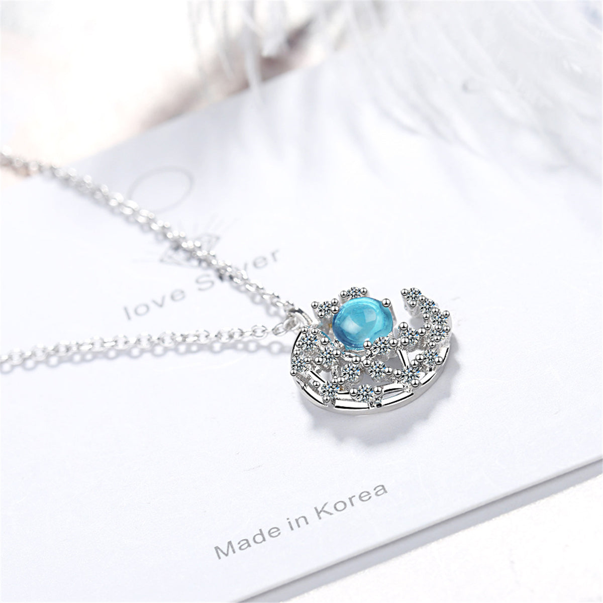 Blue Crystal and Cubic Zirconia Crescent Moon Pendant Necklace, pendant necklace for women, detail close-up