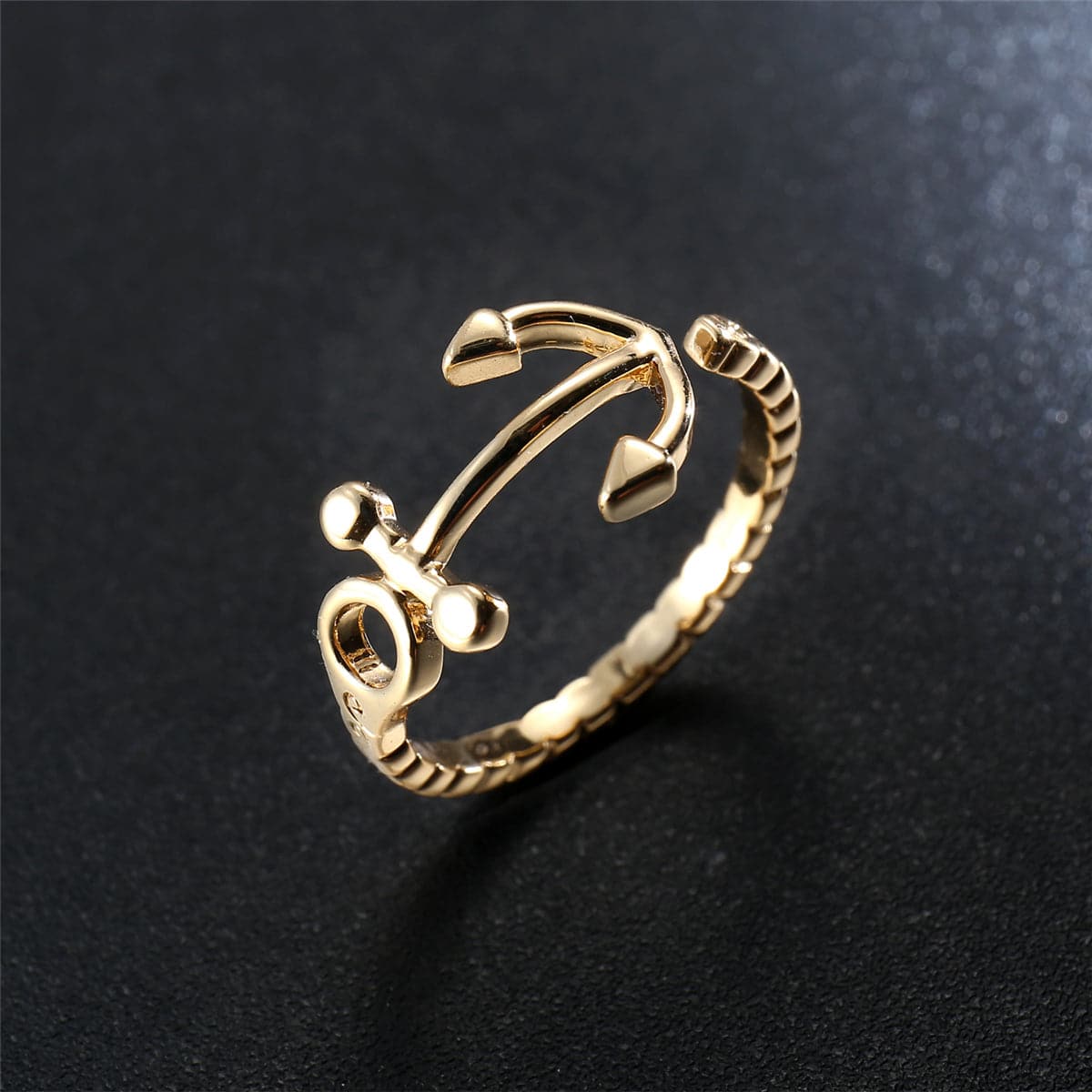 Beautifully crafted 18K gold-plated anchor ring showcasing a rope design, a must-have accessory for ocean enthusiasts.