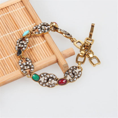 Cubic Zirconia and Resin 18K Gold-Plated Multicolor Oval Station Bracelet, gold bracelet for women, detail close-up