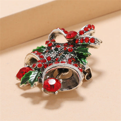 Green and Red Cubic Zirconia Christmas Bell Brooch, brooch pin, dainty minimalist design, detail close-up