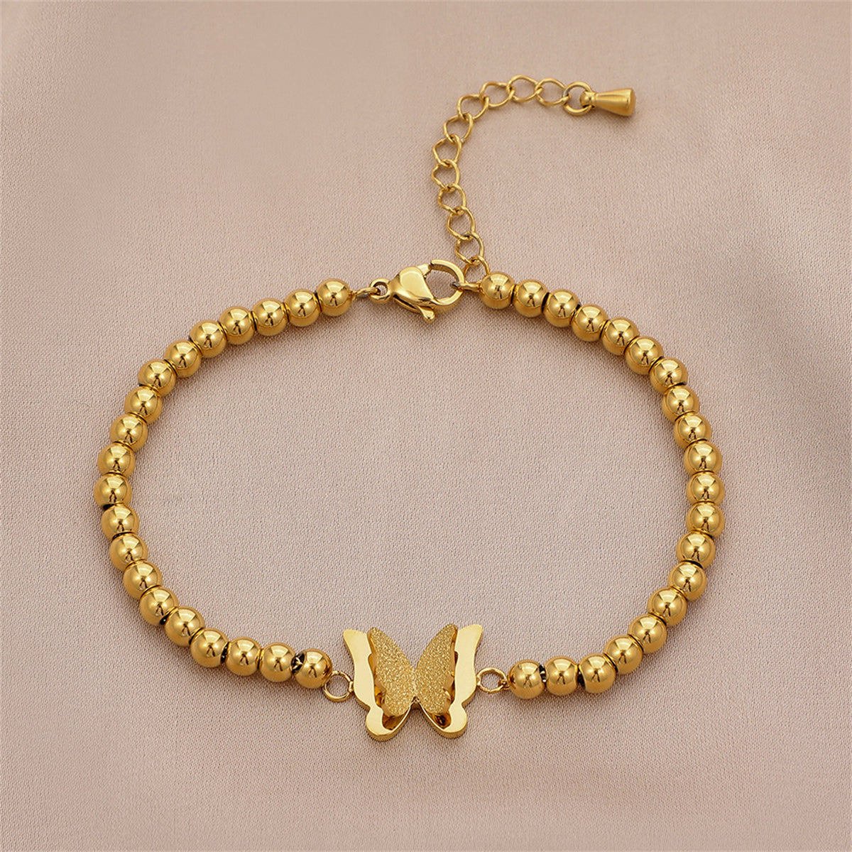 Exquisite 18K gold-plated butterfly bracelet with vibrant beads, perfect for elevating your jewelry collection effortlessly.