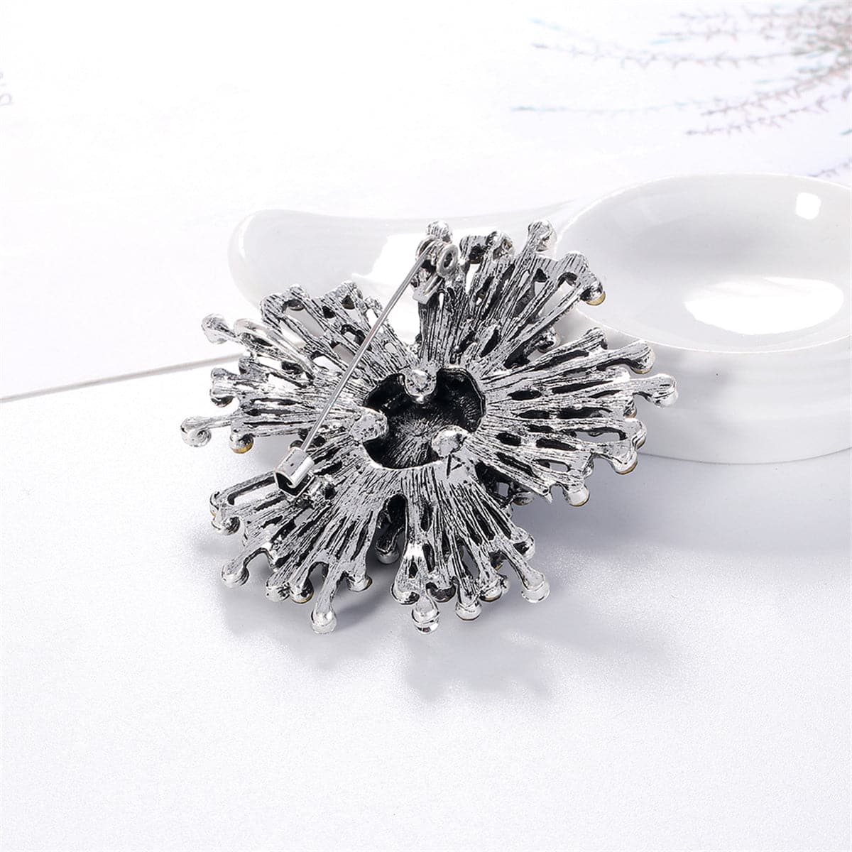 Blue Cubic Zirconia and Silver-Plated Flower Brooch, silver brooch pin, vintage-inspired design, styled look