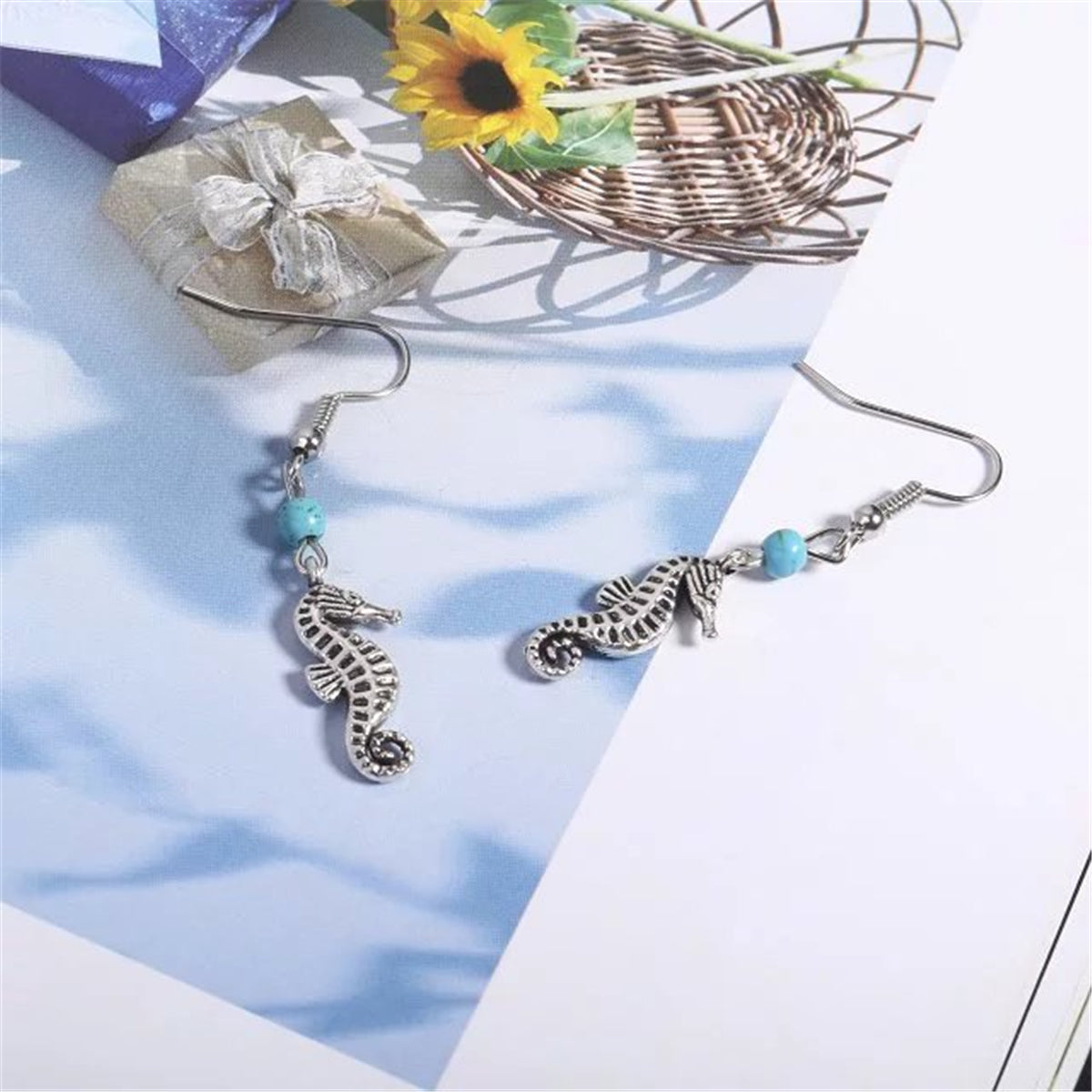 Turquoise and Silver-Plated Sea Horse Drop Earrings, silver drop earrings for women, vintage-inspired design, side view