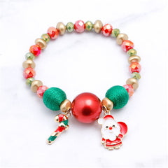 Delightful beaded stretch bracelet adorned with Santa Claus and Christmas tree charms, a must-have for Christmas cheer.